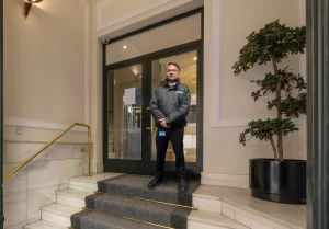 Entrance Hall Residential Apartment Building With Carpet White Marble Stairs